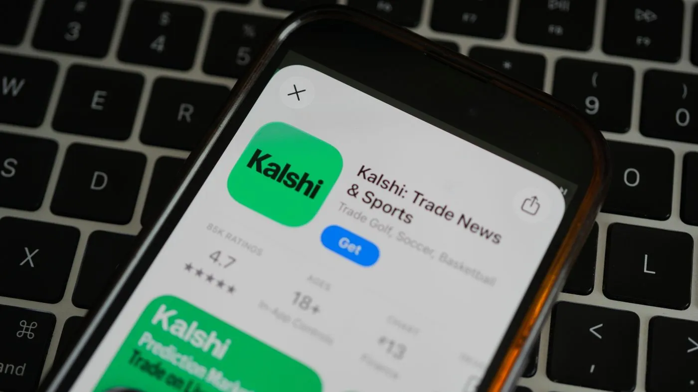 An ad for the prediction market app Kalshi is displayed on a mobile phone on April 16, 2026, in Chicago.