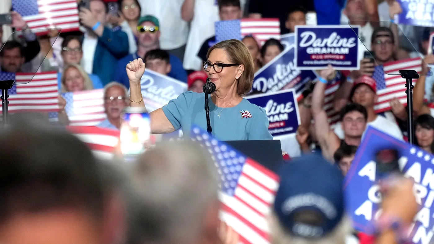 Sen. Darline Graham (R-S.C.) pumps her arm to the music as she takes the stage ahead of the arrival President Trump at a campaign rally for her as Graham competes in a special Republican primary to replace her brother, the late Sen. Lindsey Graham (R-S.C.) on Aug. 21, 2026, in Myrtle Beach, S.C.