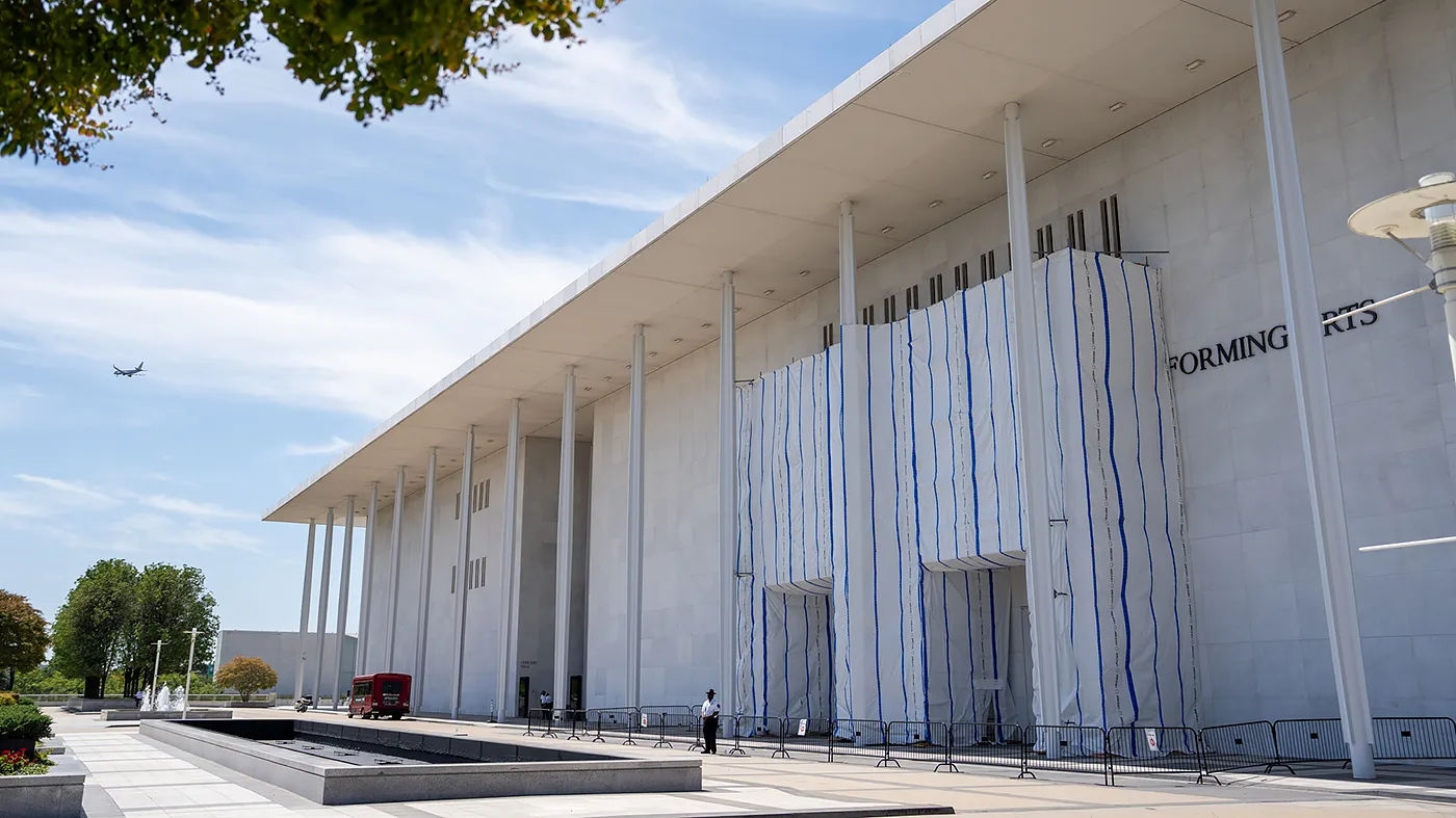 The Kennedy Center is adorned with scaffolding to cover the name of the building while a dispute over the renaming of the building is ongoing in Washington, D.C., on Wednesday, August 26, 2026.