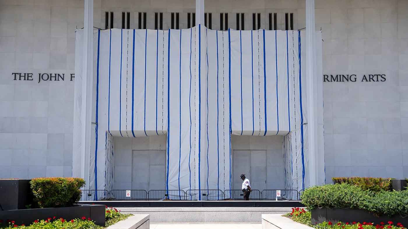 The Kennedy Center is adorned with scaffolding to cover the name of the building while a dispute over the renaming of the building is ongoing in Washington, D.C., on Wednesday, August 26, 2026.