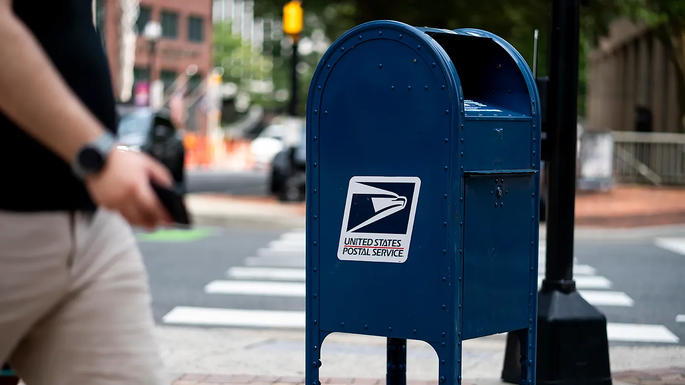 A U.S. Postal Service mail box is seen in Arlington, Va., on Aug. 27, 2026.