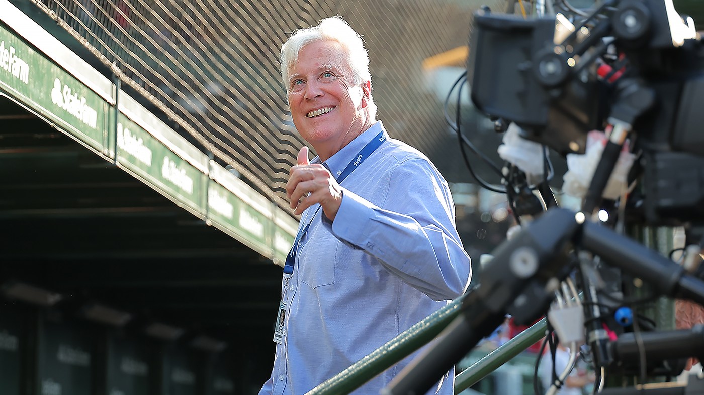 Mark Walter, chair and controlling owner of the Los Angeles Dodgers, acknowledges a fan prior to a baseball game against the Chicago Cubs, Aug. 4, 2026, in Chicago.
