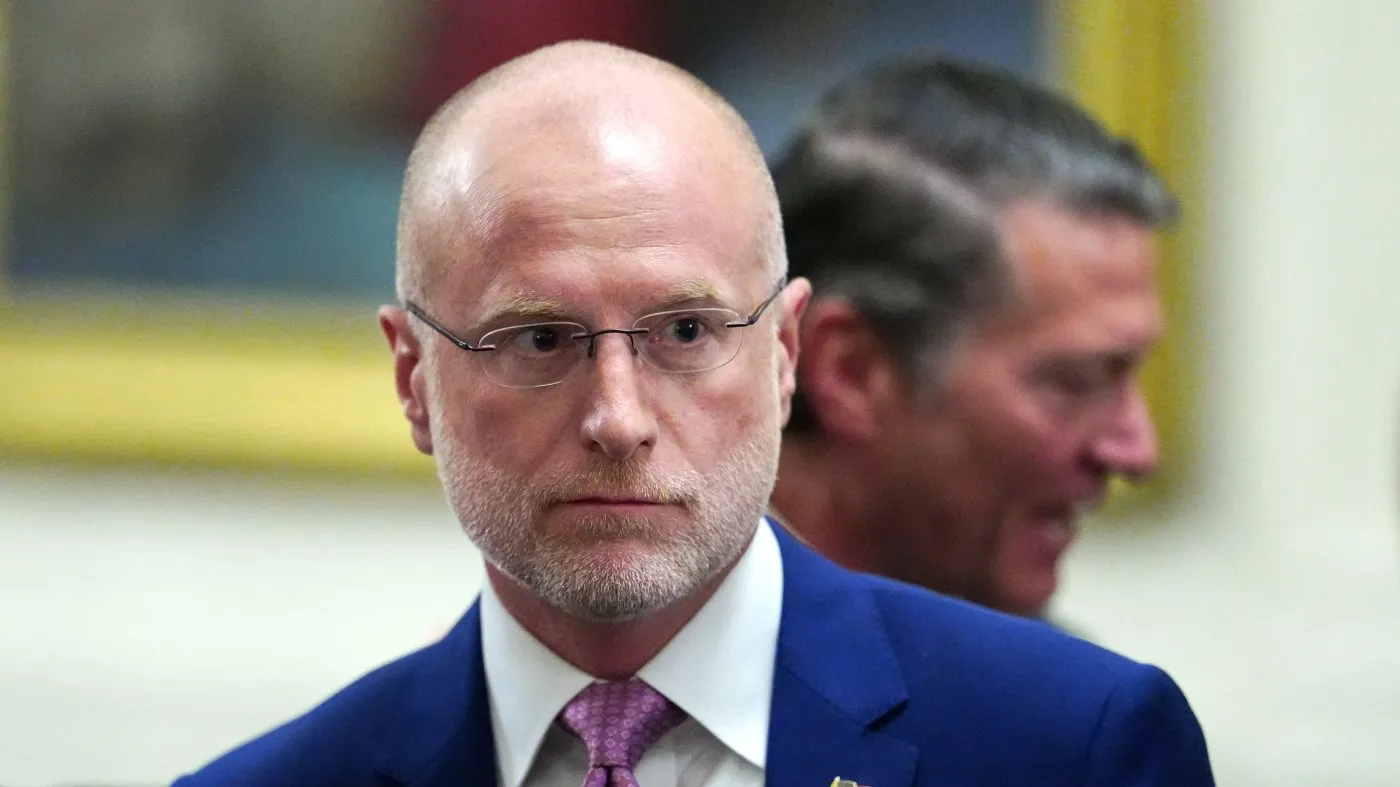 Brendan Carr, chair of the Federal Communications Committee, departs an event in the East Room of the White House, March 20, 2026, in Washington.