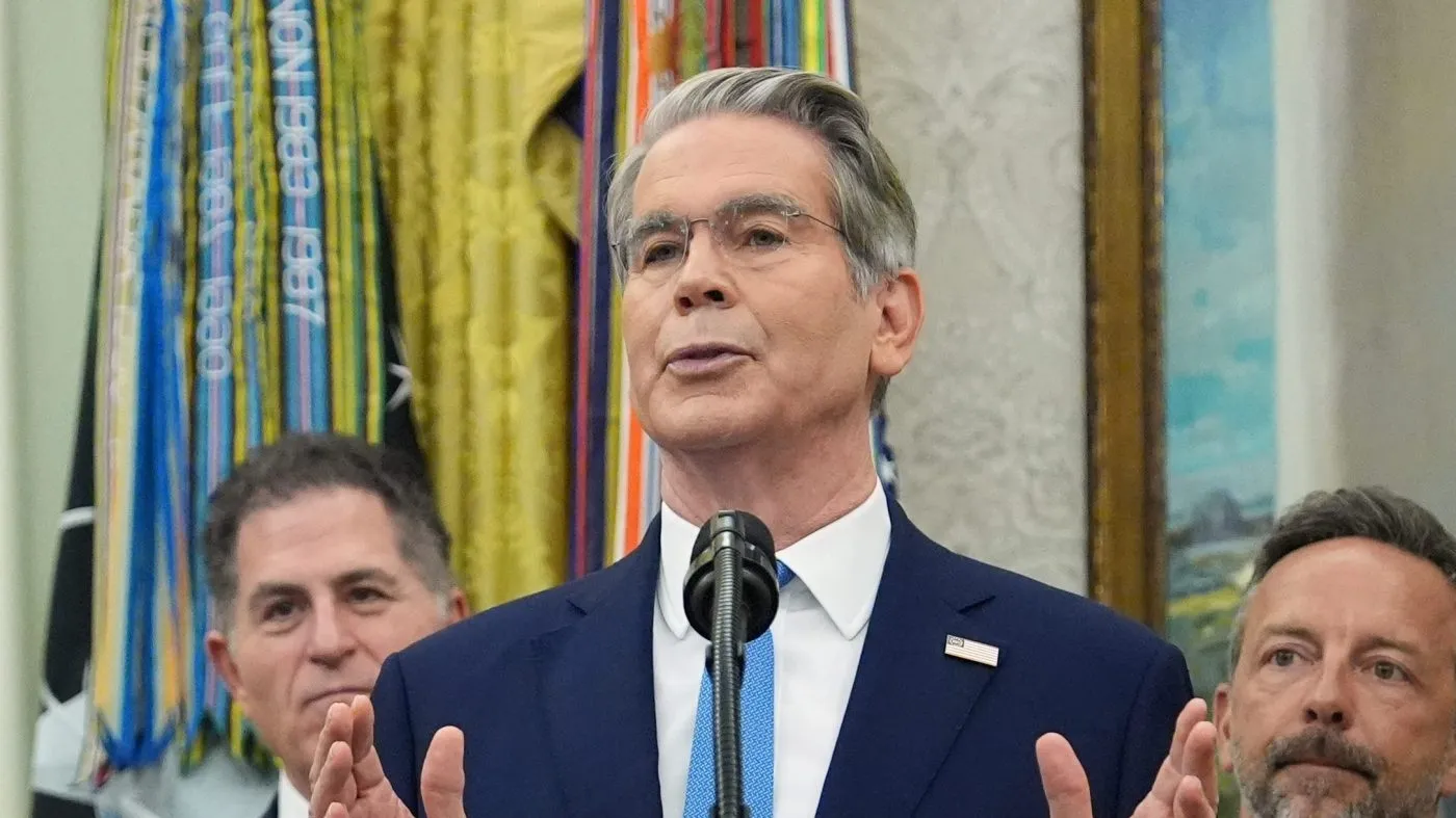 Treasury Secretary Scott Bessent speaks before President Donald Trump rings the opening bell for the New York Stock Exchange and the Nasdaq in the Oval Office at the White House, Monday, July 6, 2026, in Washington. (AP Photo/Mark Schiefelbein)