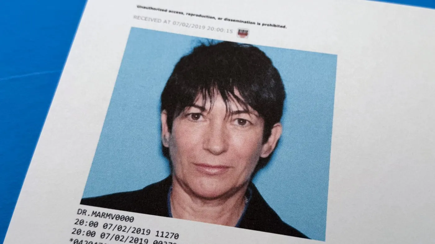 A document that was included in the U.S. Department of Justice release of the Jeffrey Epstein files, photographed Tuesday, Feb. 10, 2026, shows a photo of Ghislaine Maxwell in 2019. (AP Photo/Jon Elswick)
