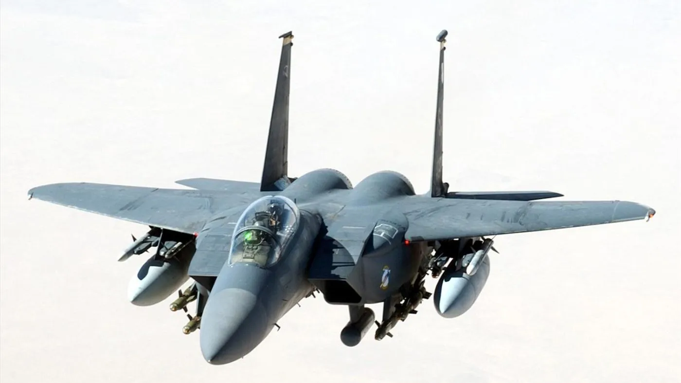 A U.S. Air Force F-15E Strike Eagle fighter jet in flight.