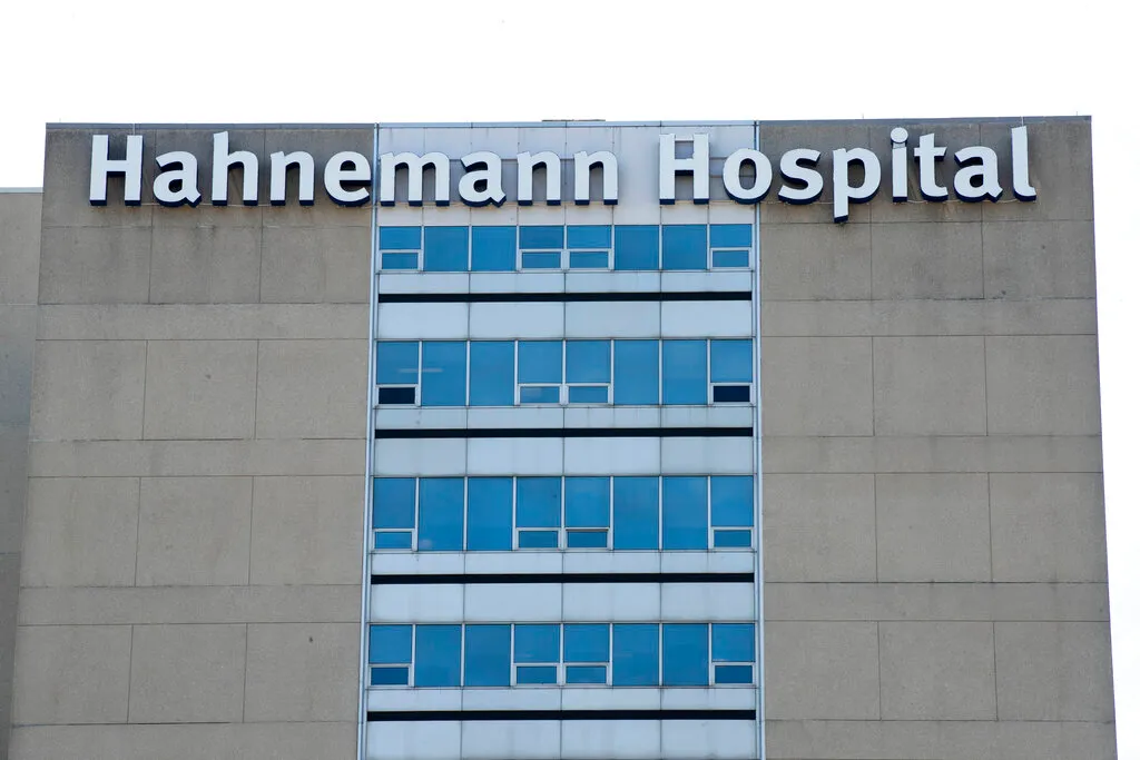 Shown is Hahnemann University Hospital in Philadelphia, Wednesday, June 26, 2019. The owner of hospital has announced it will close in September because of what the company calls “continuing, unsustainable financial losses.” (AP Photo/Matt Rourke)