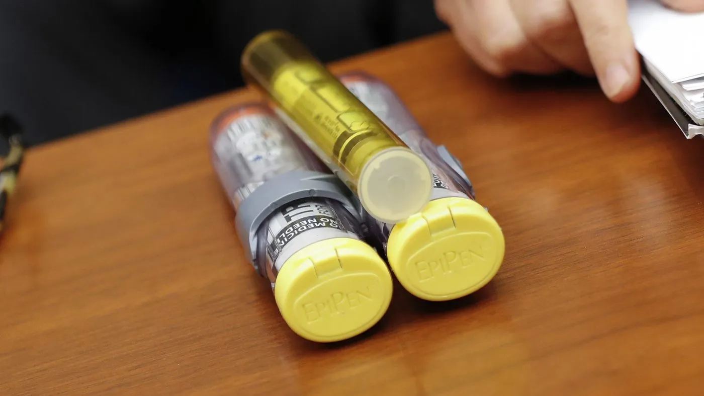 FILE – In this Sept. 21, 2016, file photo EpiPens that Mylan CEO Heather Bresch bought with her are seen on Capitol Hill in Washington as she testifies before the House Oversight Committee hearing on EpiPen price increases. Pfizer, the country’s largest drugmaker, will absorb the generic pharmaceutical company Mylan, potentially creating a global generic powerhouse, the two companies said Monday, July 29, 2019. (AP Photo/Pablo Martinez Monsivais, File)