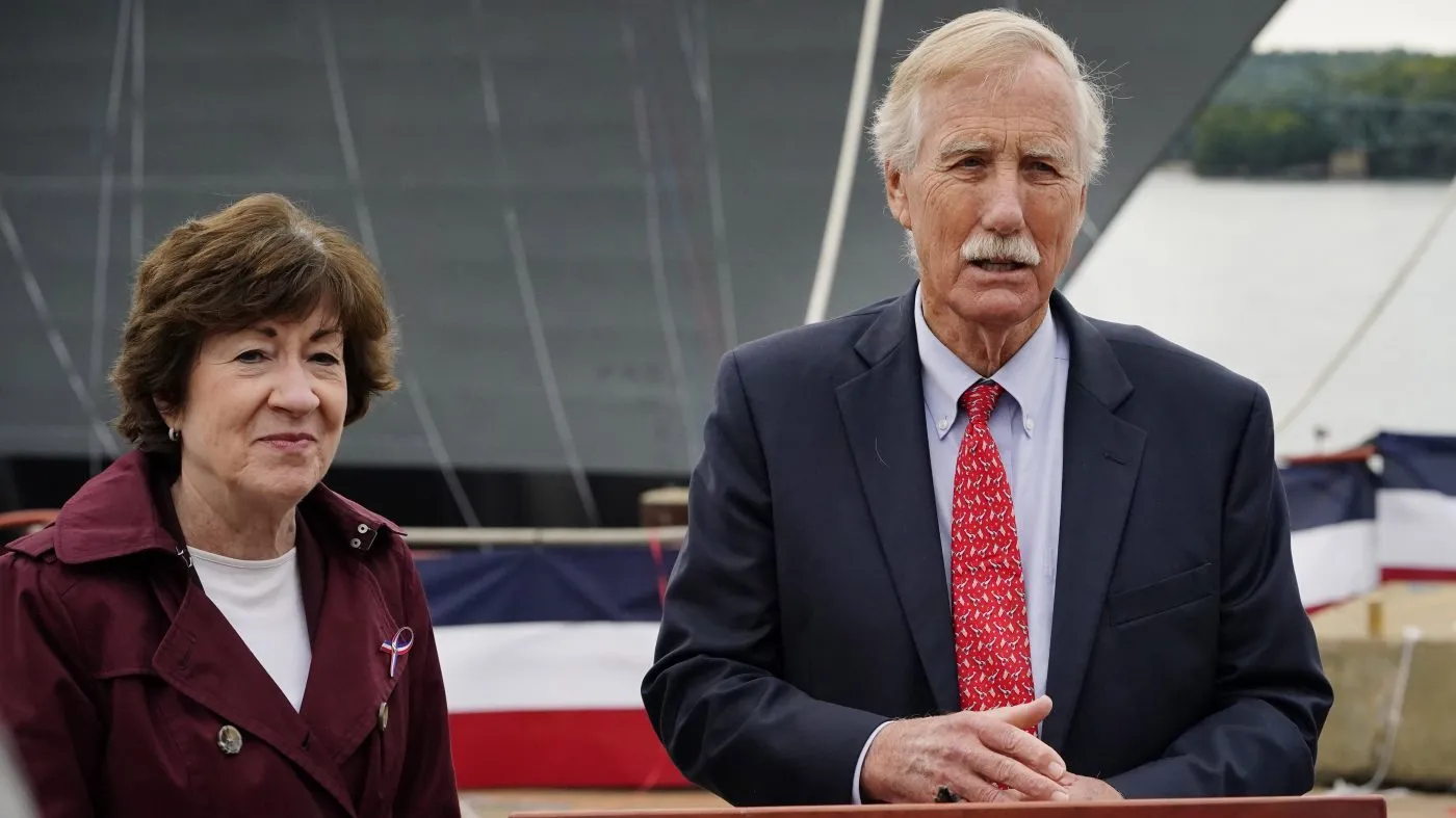 Sen. Susan Collins, R-Maine, left, and Sen. Angus King, I-Maine, take questions from reporters, Saturday, Oct. 2, 2021, in Bath, Maine. (AP Photo/Robert F. Bukaty)