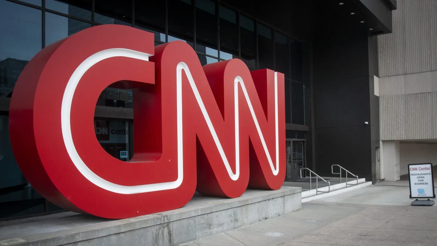 FILE – The CNN logo is displayed at the entrance to the CNN Center in Atlanta on Feb. 2, 2022. Cable news ratings are down across the board compared to 2022, when Russia’s invasion of Ukraine was in the news. CNN’s dip is most dramatic — 61% in prime-time in March. (AP Photo/Ron Harris, File)