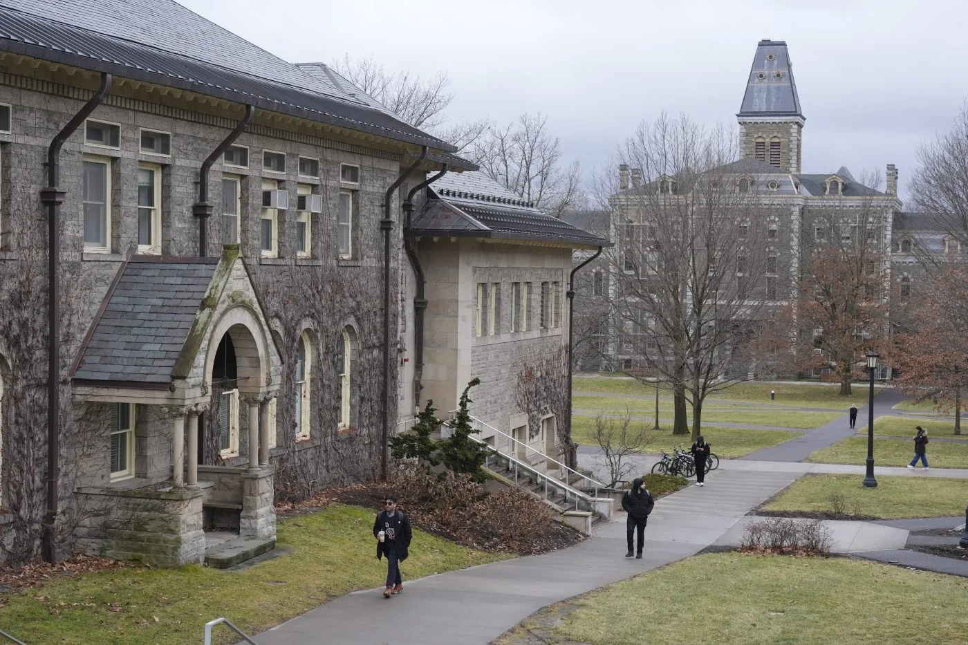 FILE – People walk on the campus of Cornell University in Ithaca, N.Y., Feb. 2, 2024. (AP Photo/Seth Wenig, File)