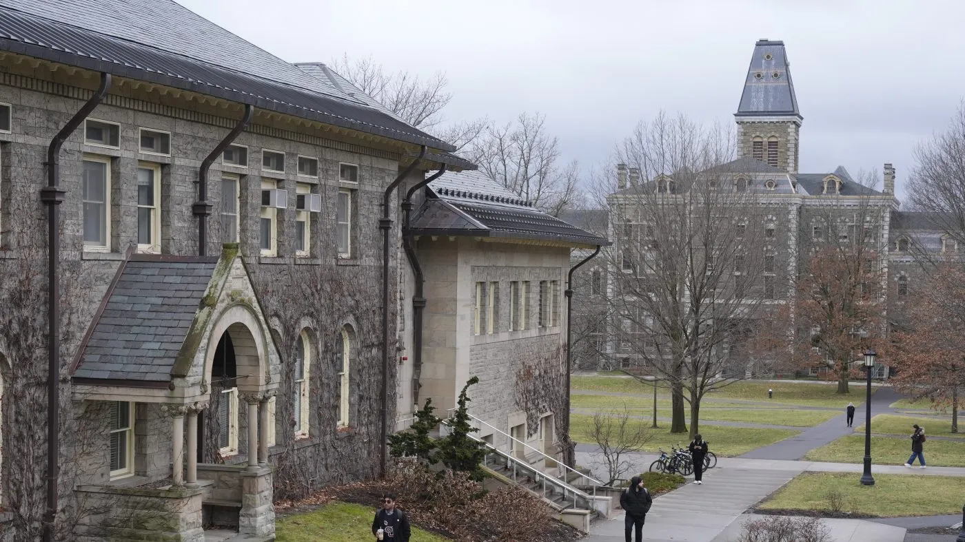 People walk on the campus of Cornell University in Ithaca, N.Y., Feb. 2, 2024.