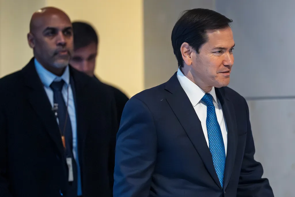 Secretary of State Marco Rubio arrives to join Defense Secretary Pete Hegseth in a secure room in the basement of the Capitol to brief lawmakers on the military strike on a suspected drug smuggling boat and its crew in the Caribbean near Venezuela Sept. 2, at the Capitol in Washington, Tuesday, Dec. 9, 2025. (AP Photo/J. Scott Applewhite)