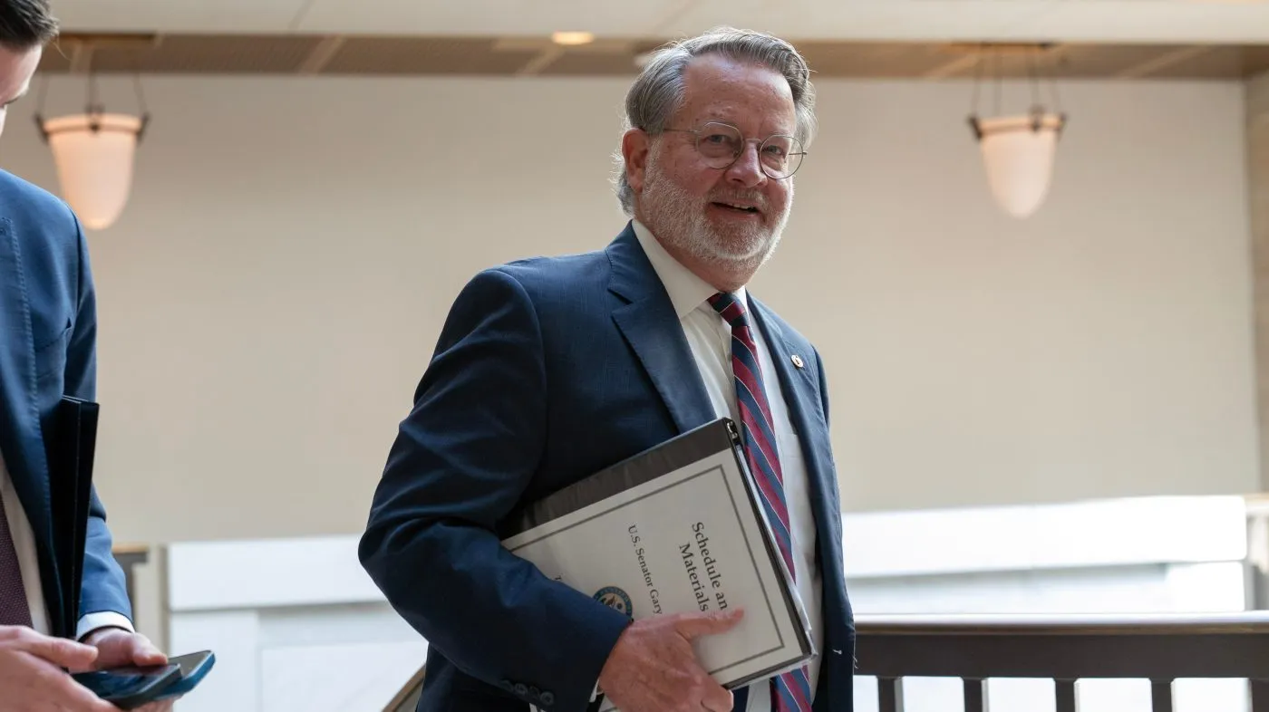 Sen. Gary Peters (D-Mich.) leaves after a closed-door briefing on the Iran war before the Senate Armed Services Committee at the Capitol on March 10, 2026, in Washington.