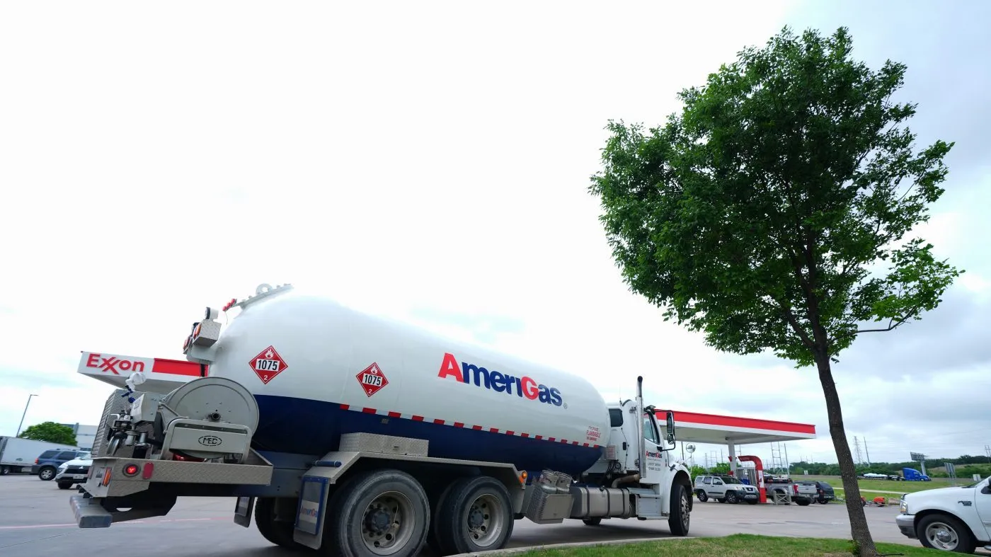 A truck carrying fuel is seen parked at a gas station, April 14, 2026, in Dallas.