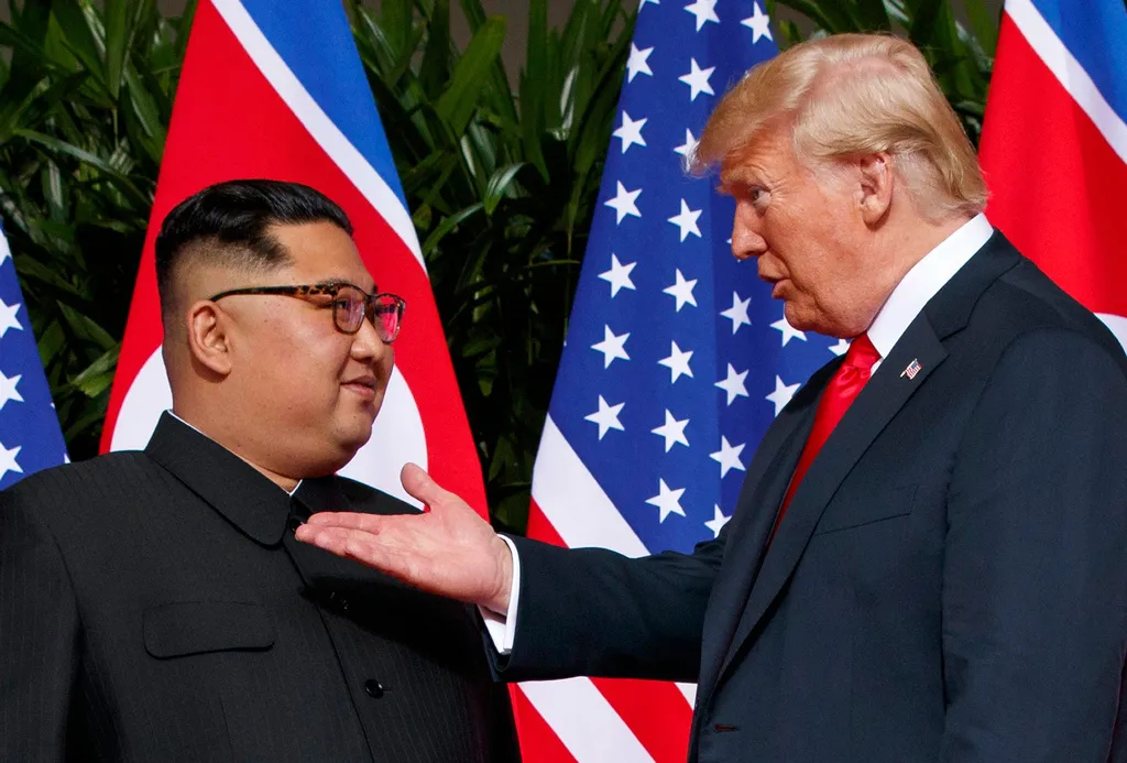FILE – U.S. President Donald Trump, right, meets with North Korean leader Kim Jong Un on Sentosa Island in Singapore, on June 12, 2018. (AP Photo/Evan Vucci, File)