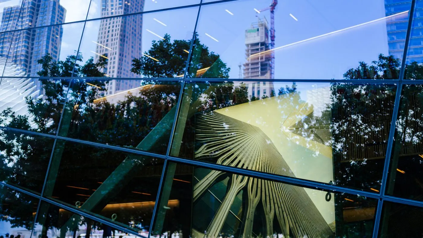 The 9/11 Museum displays an image of one of the Twin Towers outside the 9/11 memorial site at Ground Zero, 25 years after the attacks on the World Trade Center, on Friday, Aug. 7, 2026, in New York. (AP Photo/Angelina Katsanis)