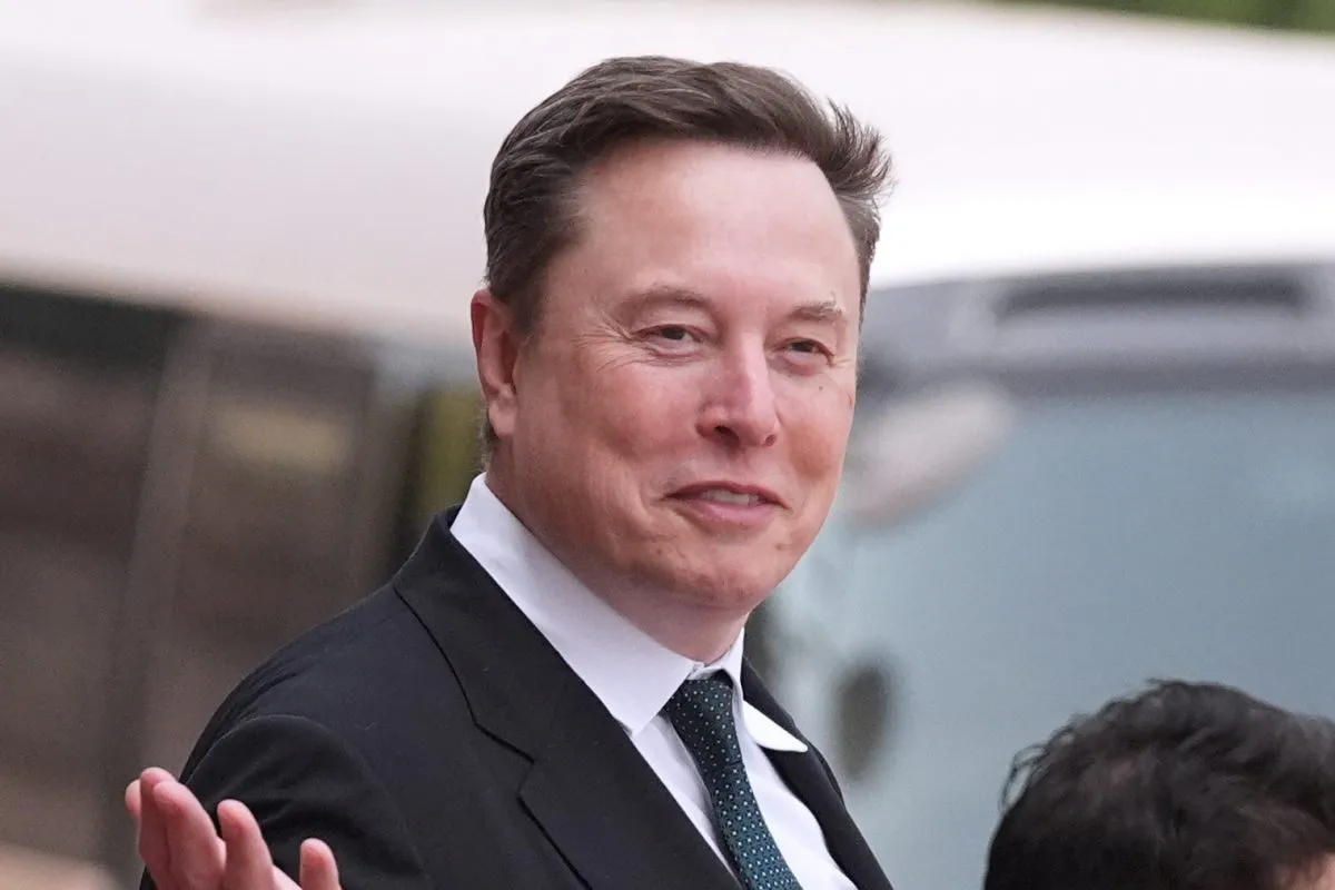 FILE – Elon Musk departs after a welcome ceremony with President Donald Trump and China’s President Xi Jinping at the Great Hall of the People, May 14, 2026, in Beijing. (AP Photo/Mark Schiefelbein, File)