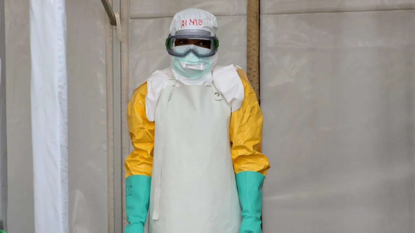 A health worker pauses after disinfecting a treatment center for Ebola patients, in Beni, North Kivu province, eastern Congo, Monday, Aug. 31, 2026. (AP Photo/Sebastien Kitsa Musayi)