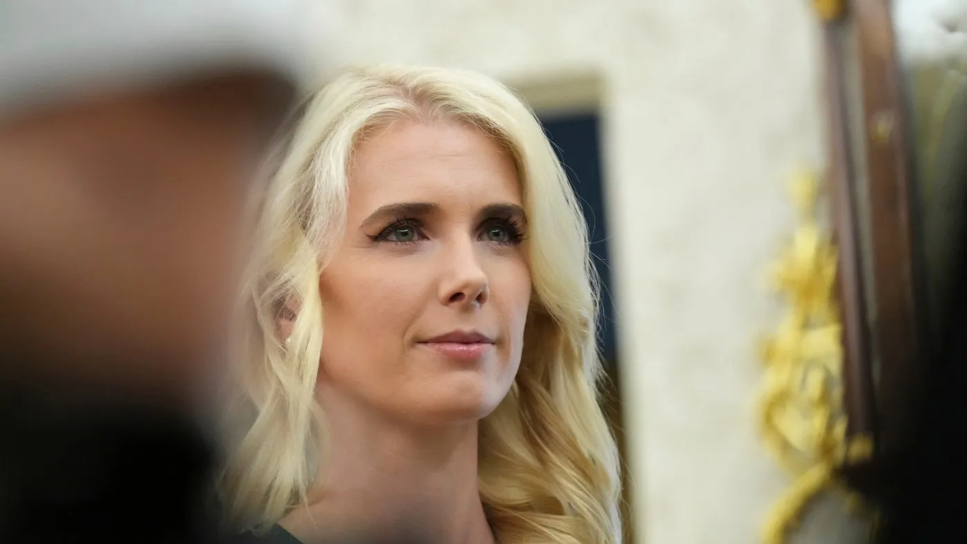 White House aide Natalie Harp listens as President Donald speaks in the Oval Office of the White House on Aug. 31, 2026, in Washington.