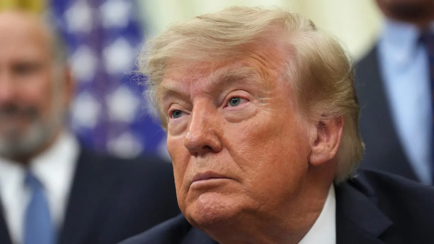President Trump listens as a reporter asks a question in the Oval Office of the White House, Aug. 31, 2026, in Washington.