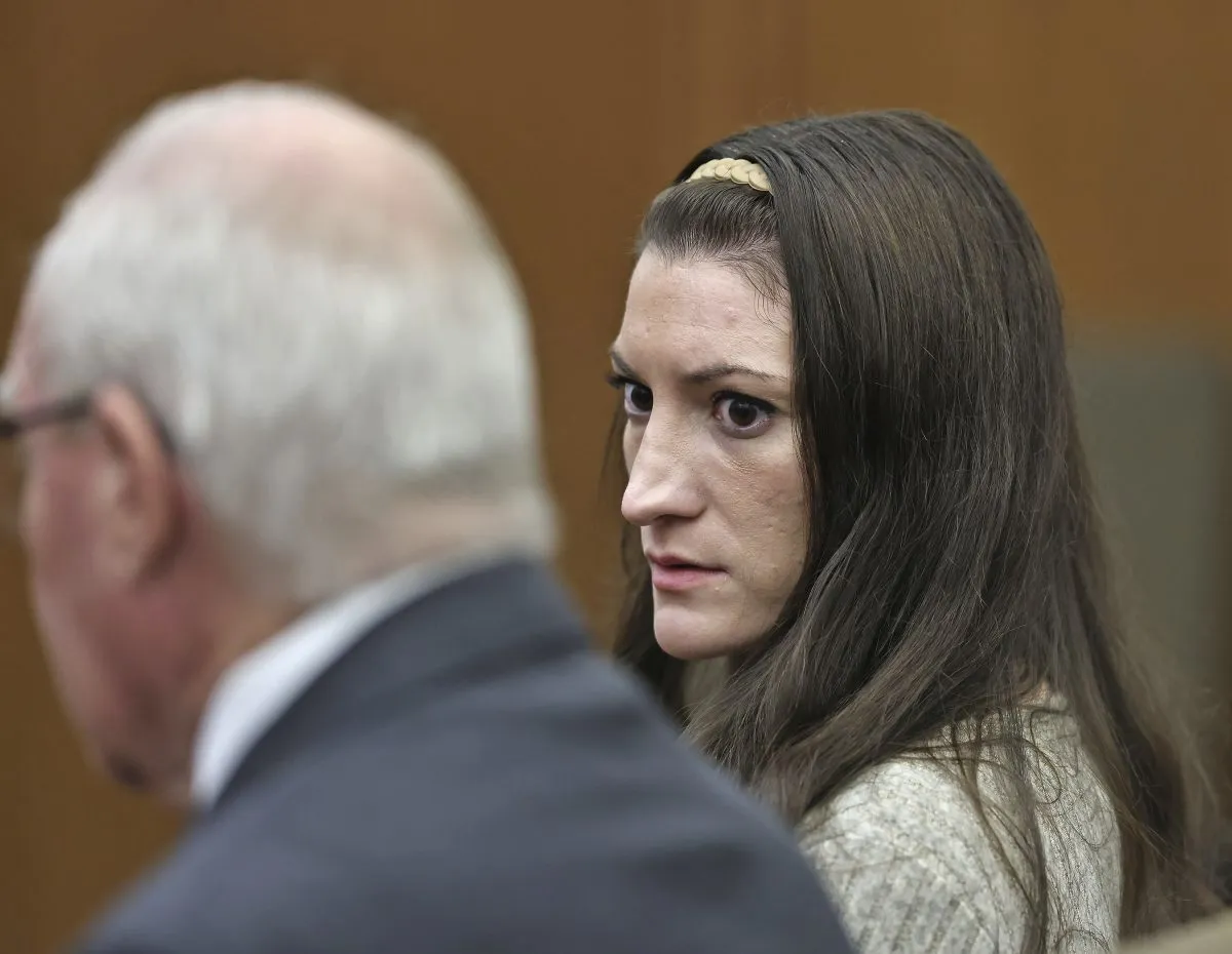 Lindsay Clancy looks to her lawyer Kevin Reddington as the jury keeps deliberating at her murder trial at Plymouth Superior Court in Plymouth, Mass., Tuesday, Sept. 1, 2026. (Greg Derr/The Patriot Ledger via AP, Pool)
