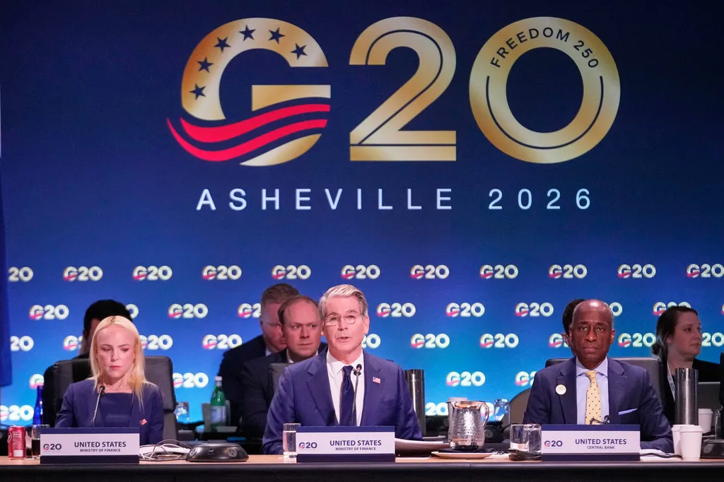 Treasury Secretary Scott Bessent, center, speaks during a plenary session on sovereign debt at the G20 Finance Ministerial in Asheville, N.C., Tuesday, Sept. 1, 2026. Left is Erin Browne, Treasury Under Secretary for International Affairs, and right is Philip Jefferson, Vice Chairman of the Federal Reserve. (AP Photo/Gerald Herbert)