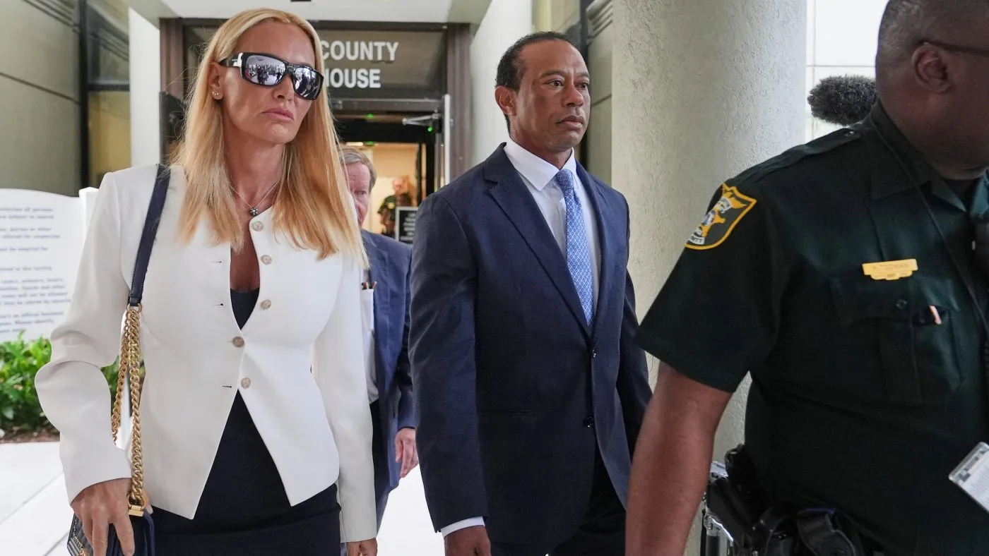 Golfer Tiger Woods, right, leaves with Vanessa Trump, left, after Woods’s plea conference hearing in a DUI case stemming from a rollover crash in Florida in March, Sept. 2, 2026, in Stuart, Fla.
