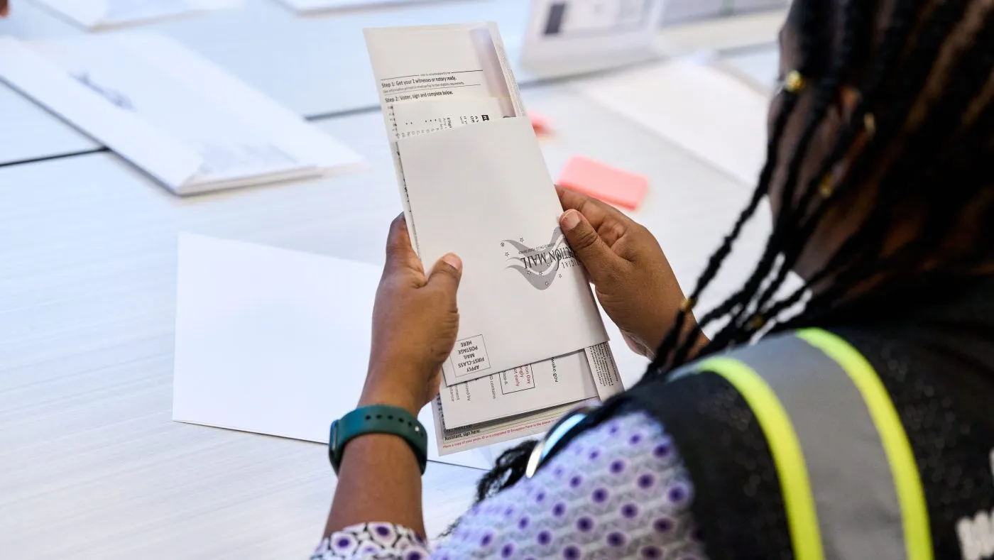 Wake County Board of Elections employees prepare absentee ballots to be mailed on Thursday, Sept. 3, 2026, in Raleigh, N.C. (AP Photo/Matt Ramey)