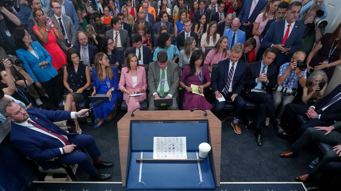 A media outlet seating chart is pictured after Vice President JD Vance departed after speaking during a press briefing at the White House in Washington, Thursday, Sept. 3, 2026. (AP Photo/Mark Schiefelbein)