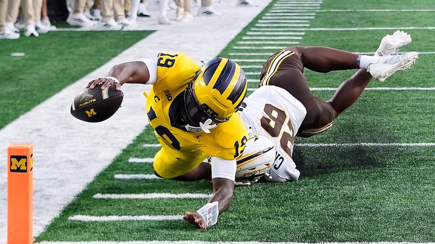 Michigan quarterback Bryce Underwood (19) reaches for the goal line but comes up short as Western Michigan safety Kouri Crump makes the tackle the during their Sept. 5, 2026, game in Ann Arbor, Mich.