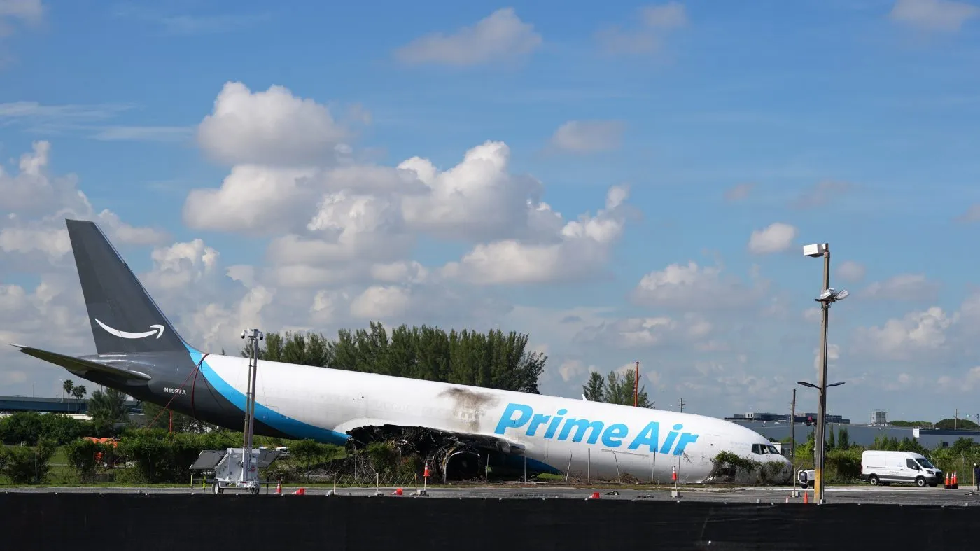 An Amazon cargo plane sits near Miami International Airport two days after overshooting a runway, Tuesday, Sept. 8, 2026, in Miami. (AP Photo/Rebecca Blackwell)
