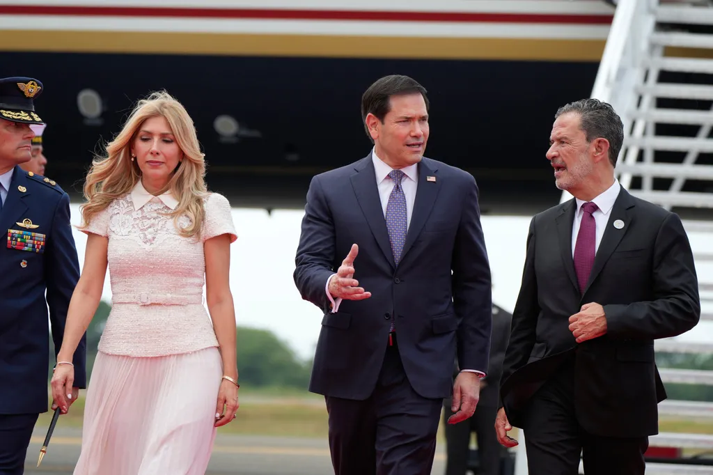 U.S. Secretary of State Marco Rubio, center, and his wife Jeanette Rubio walk with Colombia’s Foreign Minister Omar Bula as they arrive at the international airport Ernesto Cortissoz in Barranquilla, Colombia, Tuesday, Sept. 8, 2026. (AP Photo/Fernando Vergara, Pool)
