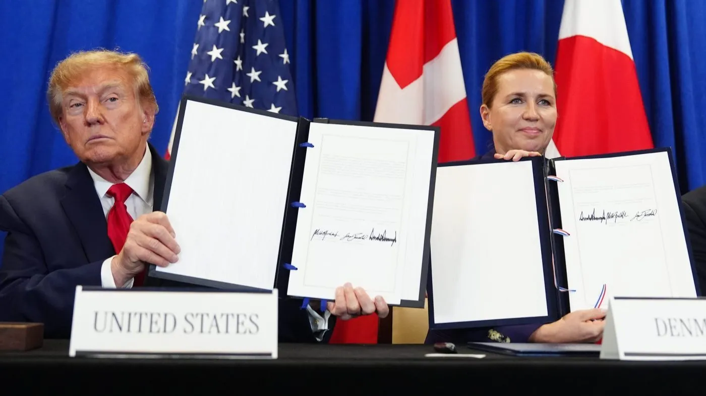 President Donald Trump signs a security agreement with Denmark’s Prime Minister Mette Frederiksen and Greenland’s Prime Minister Jens-Frederik Nielsen during the United Nations General Assembly, Tuesday, Sept. 22, 2026, at the UN headquarters. (AP Photo/Julia Demaree Nikhinson)