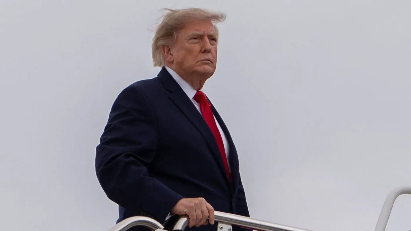 President Donald Trump boards Air Force One, Monday, Sept. 21, 2026, Joint Base Andrews, Md. (AP Photo/Julia Demaree Nikhinson)