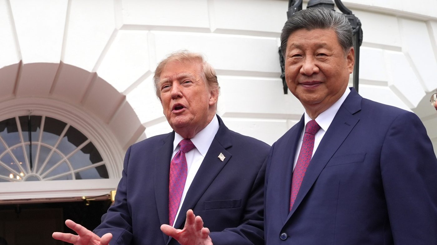 President Donald Trump, left, speaks to reporters during a tour of the South Lawn of the White House with China’s President Xi Jinping, right, Thursday, Sept. 24, 2026, in Washington. (AP Photo/Alex Brandon)