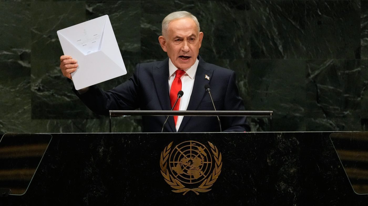 Israeli Prime Minister Benjamin Netanyahu holds up a Starlink satellite internet dish a he speaks during the 81st session of the United Nations General Assembly at United Nations headquarters, Thursday, Sept. 24, 2026. (AP Photo/Seth Wenig)