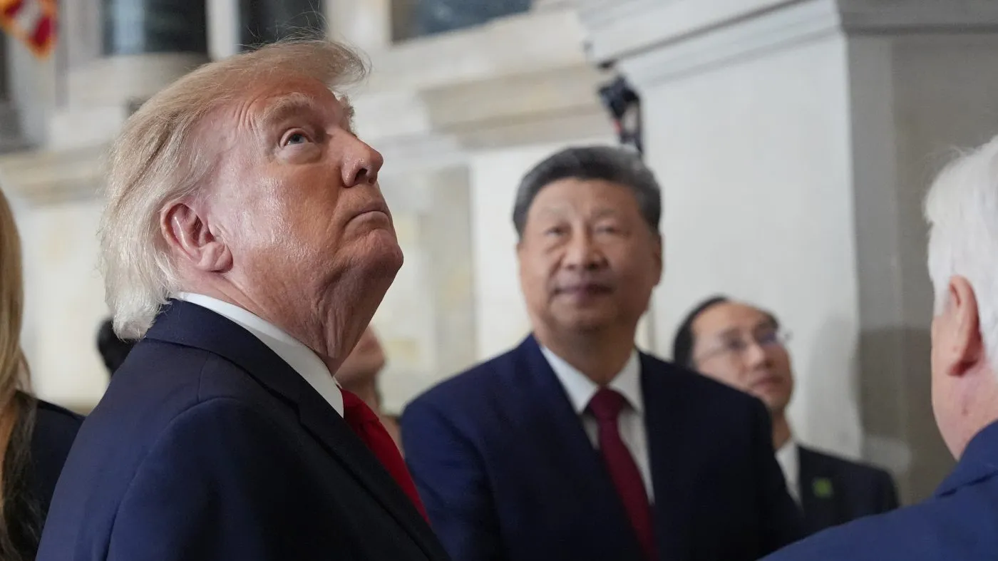 President Donald Trump, China’s President Xi Jinping with Bradford Wilson, Archivist of the United States, tour the National Archives, Friday, Sept. 25, 2026, in Washington. (AP Photo/Alex Brandon)