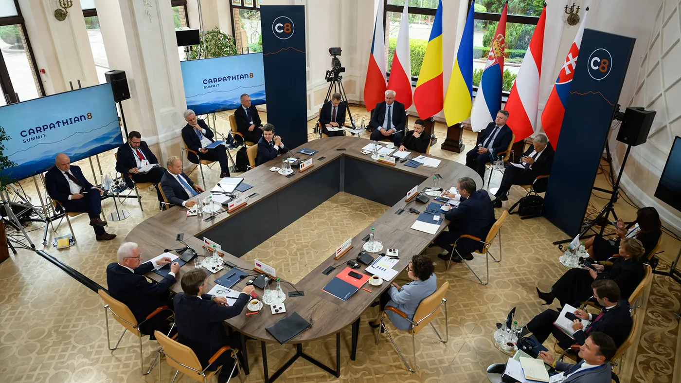 Ukrainian President Volodymyr Zelenskyy, top center right, and EU officials attend a summit in a Carpathian 8 Summit in Bukovel, western Ukraine, Sept. 18, 2026.