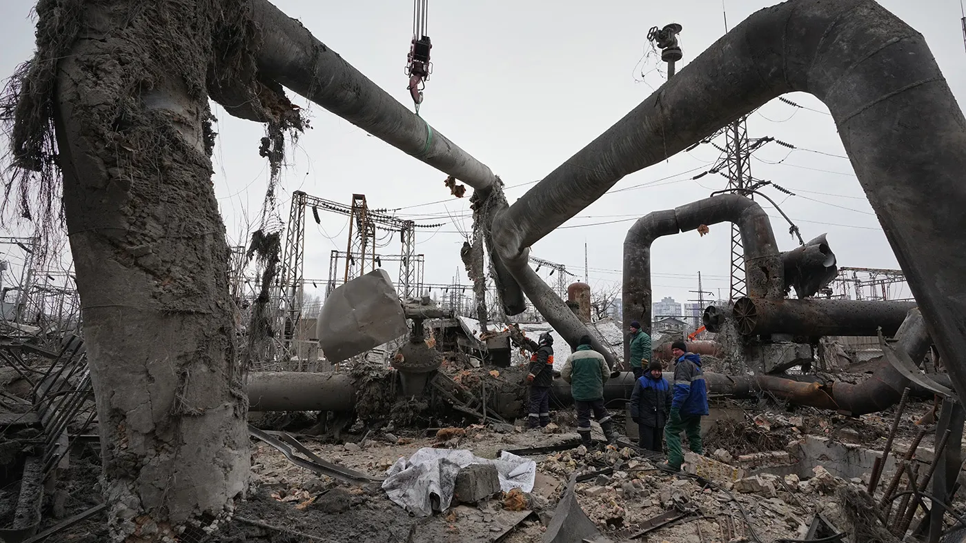 Workers clean up damage at Darnytsia Thermal Power Plant after a Russian attack in Kyiv, Ukraine, Feb. 4, 2026. (Sergei Grits, Associated Press)