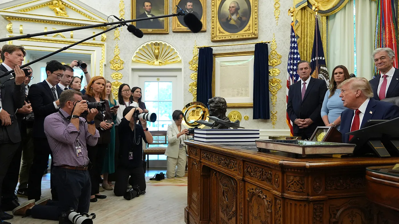 President Trump speaks with reporters during an event about healthcare in the Oval Office of the White House, Sept. 18, 2026, in Washington.