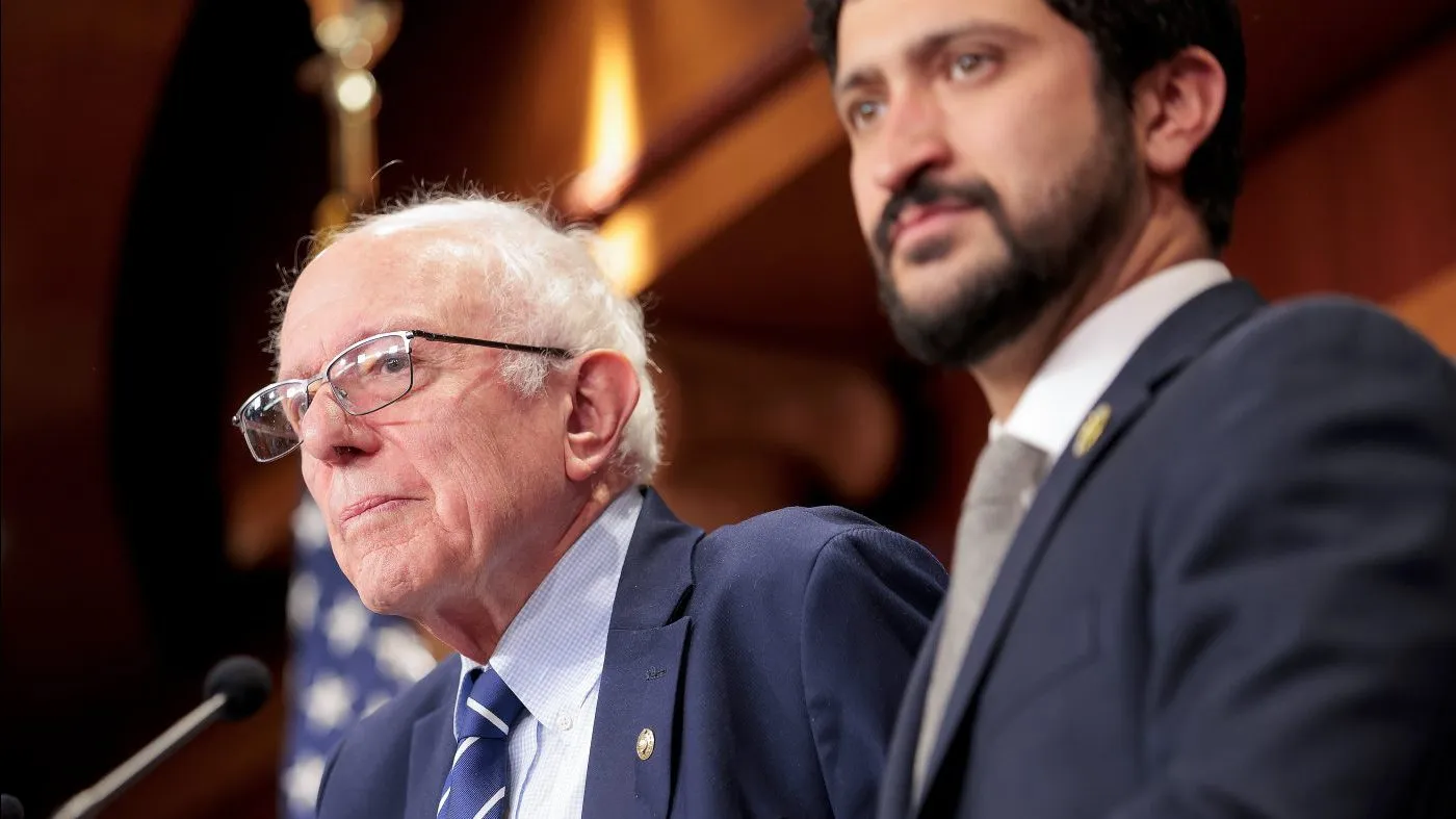 WASHINGTON, DC – MARCH 26: Sen. Bernie Sanders (I-VT) (L) speaks during a press conference with Rep. Greg Casar (D-TX) (R) in the U.S. Capitol on March 26, 2026 in Washington, DC. Sen. Bernie Sanders (I-VT) and Rep. Greg Casar (D-TX) introduced a bill “to protect sports fans and taxpayers from professional sports team relocations.” (Photo by Heather Diehl/Getty Images)