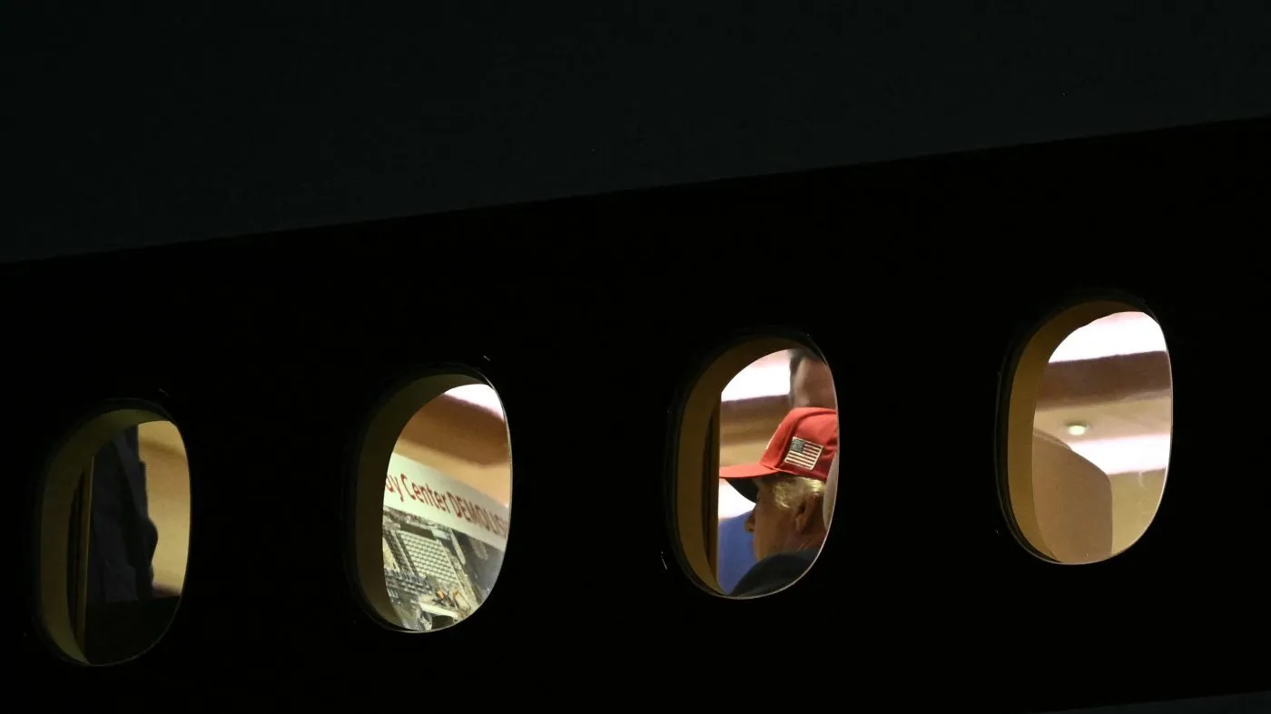 President Trump is seen aboard Air Force One checking a Kennedy Center large printout after landing at Joint Base Andrews, Md., on Sept. 16, 2026. Trump, who is returning from Gastonia, N.C., after campaigning for Republican Senate candidate Michael Whatley, threatened on Sept. 15, 2026, to keep the Kennedy Center closed for good after a judge ruled his name cannot be added on to the famed arts institution’s facade.