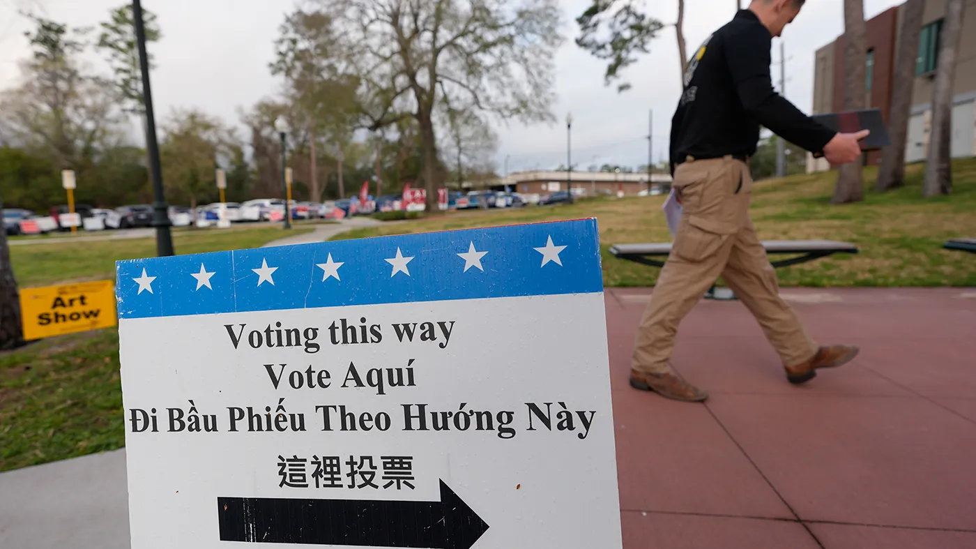 A voter makes his way into a polling location, March 3, 2026, in Spring, Texas.