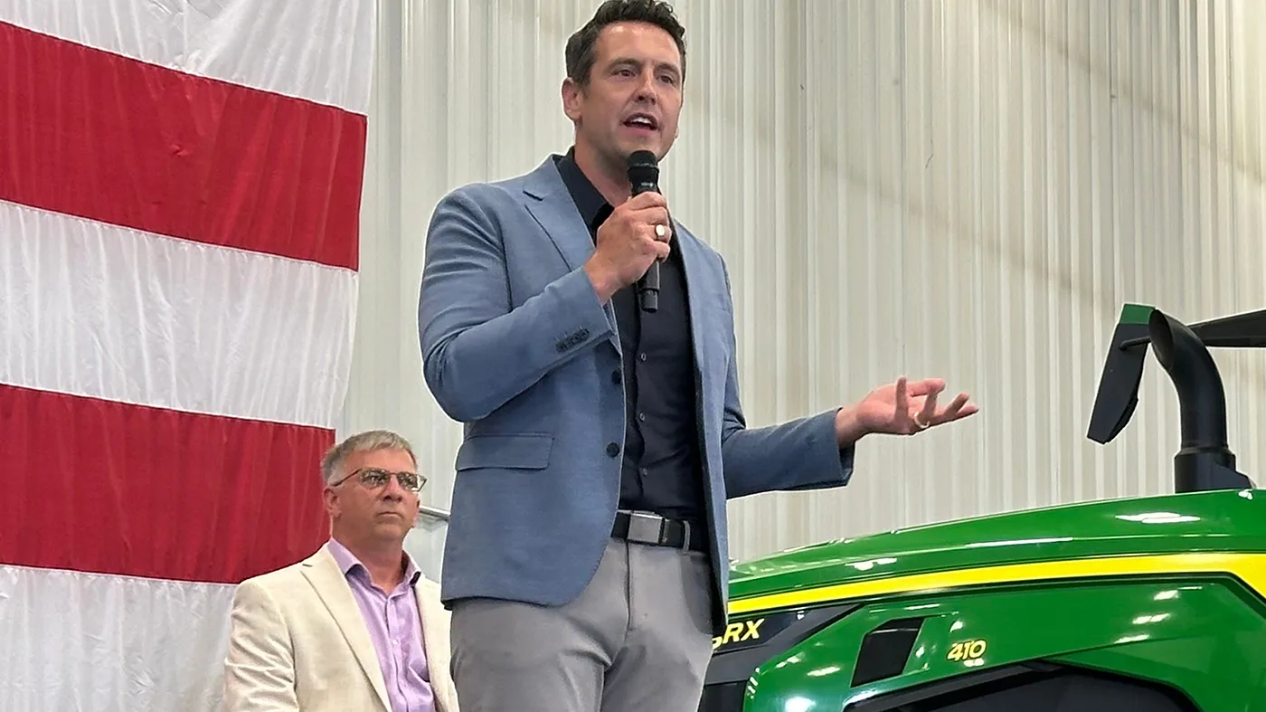 Zach Lahn, the Republican nominee for Iowa governor, talks to voters about agriculture in Arlington, Iowa, on Aug. 4, 2026.