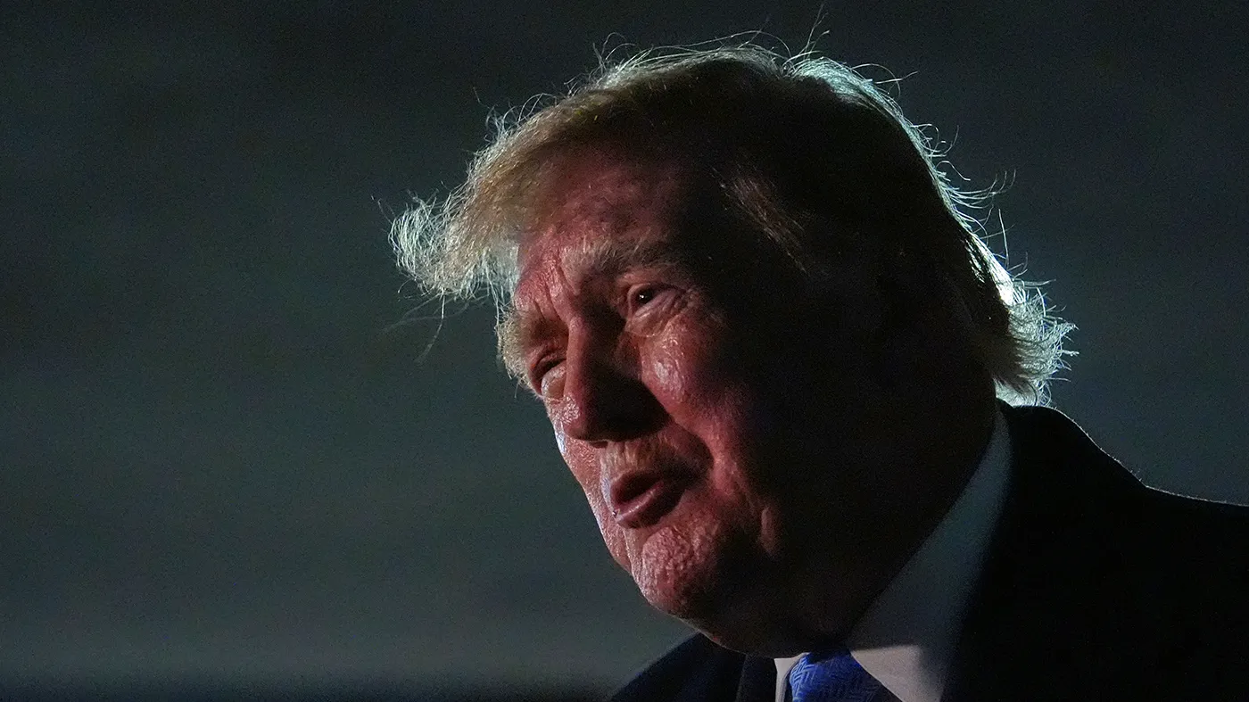 President Trump speaks with reporters upon arriving on Sept. 27, 2026, at Joint Base Andrews, Md.