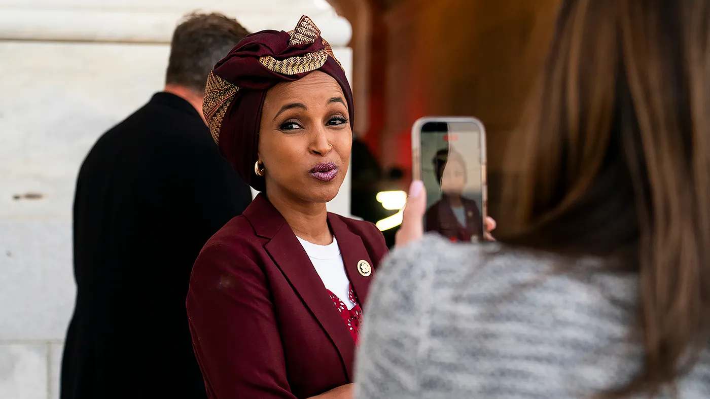 Rep. Ilhan Omar (D-Minn.) speaks to a reporter outside the House Chamber at the U.S. Capitol in Washington, D.C., following the last votes of the week on Sept. 16, 2026.