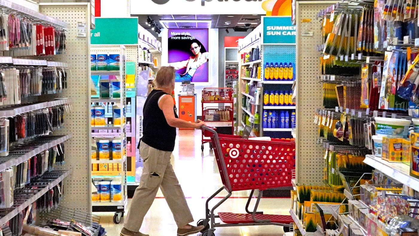 A shopper looks down an aisle in a Target store in Upper Saint Clair, Pa., on Friday, July 7, 2023. (AP Photo/Gene J. Puskar)