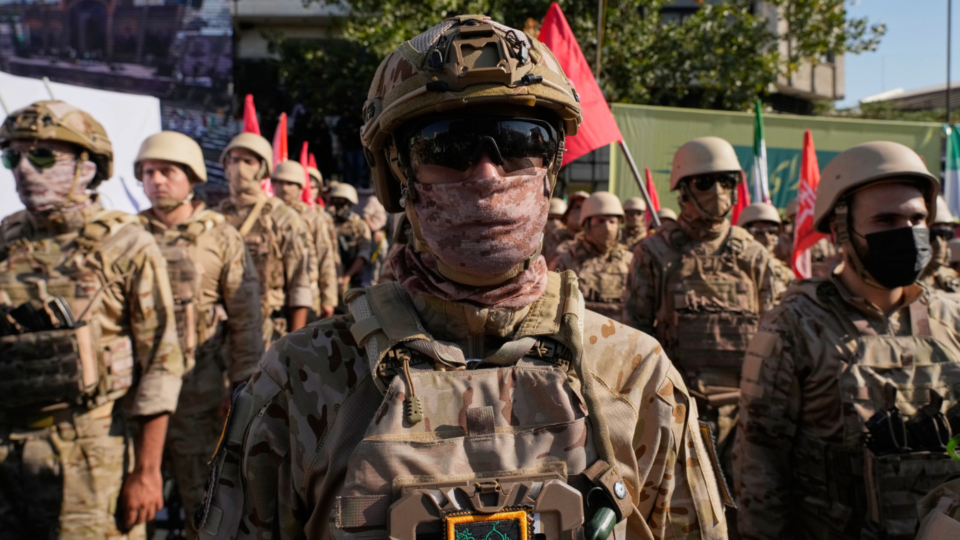 Armed personnel affiliated with Iran’s Revolutionary Guard take part in the state-organized “Janfada,” or “Sacrifice for Iran,” military exercise in Tehran, Iran, Friday, Sept. 18, 2026. (AP Photo/Vahid Salemi)