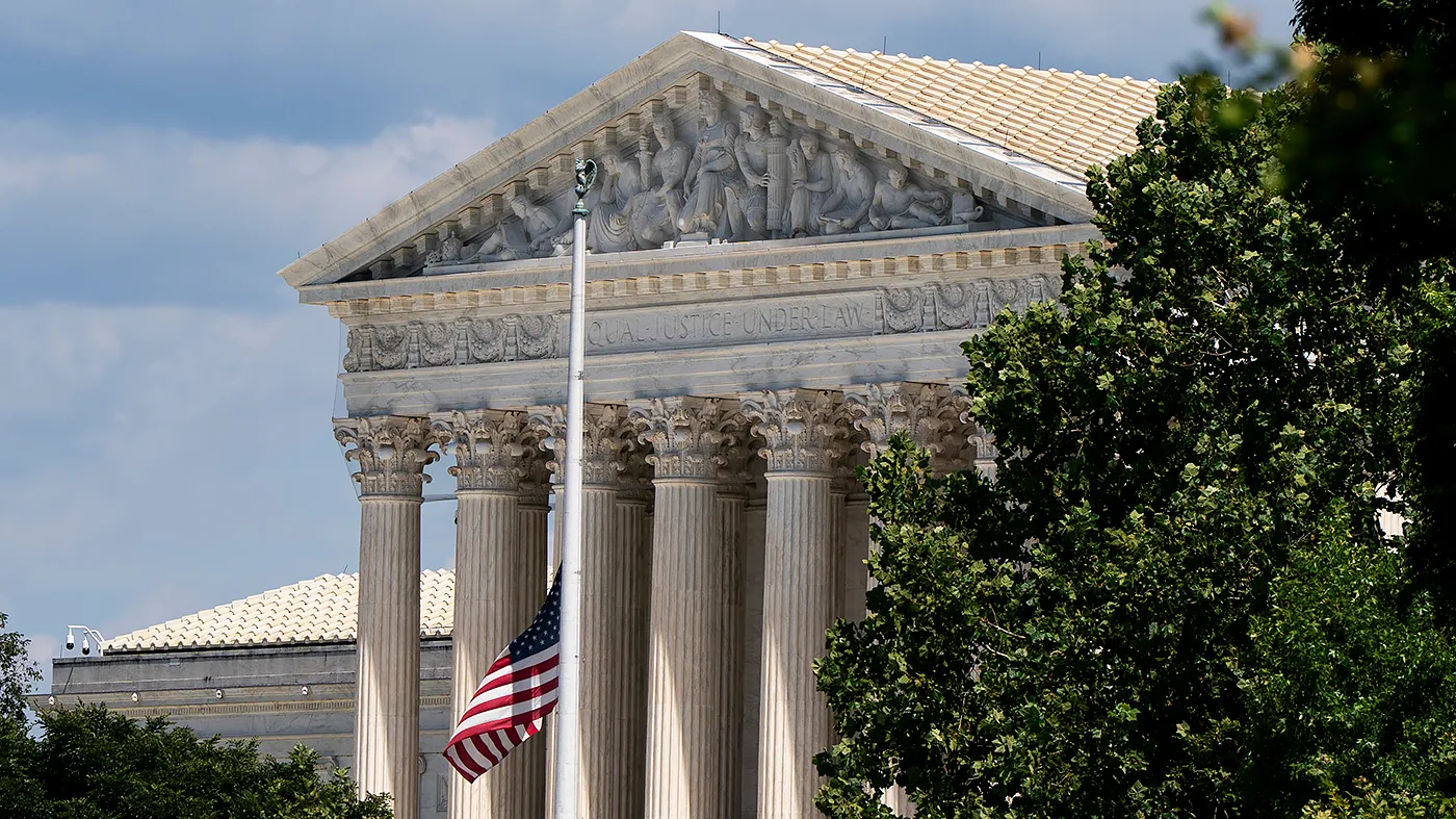 The Supreme Court in Washington, D.C., is seen Aug. 26, 2026. The American flag is seen at half-staff following the passing of country music legend Dolly Parton at the age of 80.